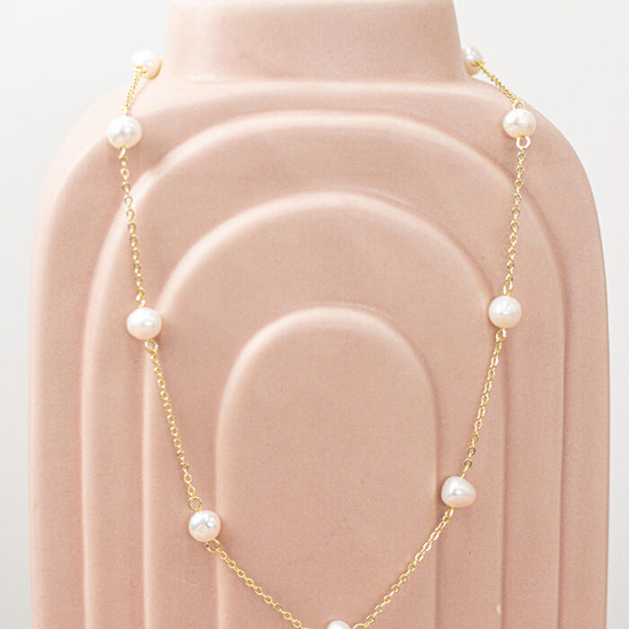 Spaced pearl necklace